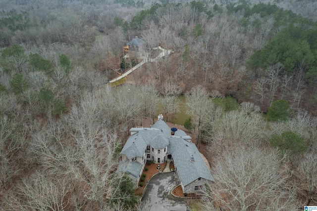 drone / aerial view with a forest view