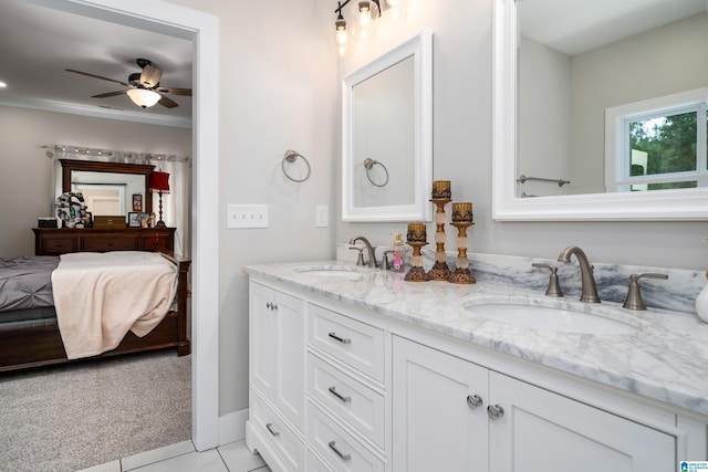 bathroom with ceiling fan and vanity