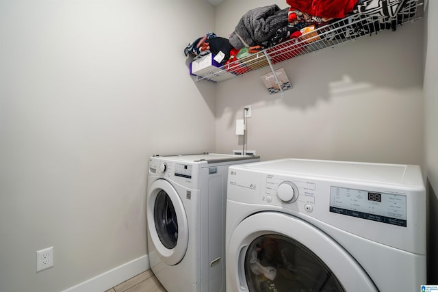 laundry area featuring independent washer and dryer