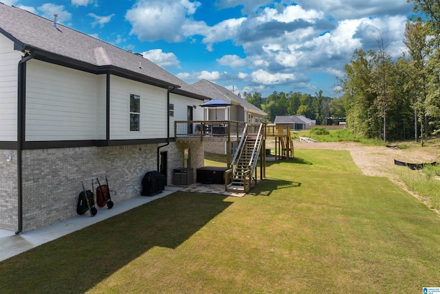 view of yard featuring a gazebo and a wooden deck