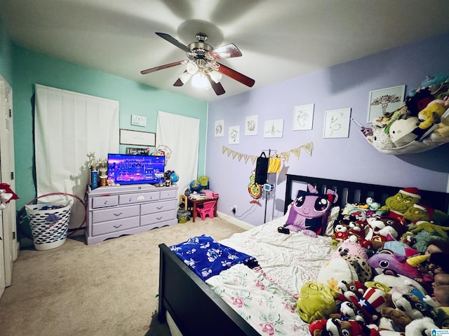 bedroom featuring ceiling fan and carpet flooring