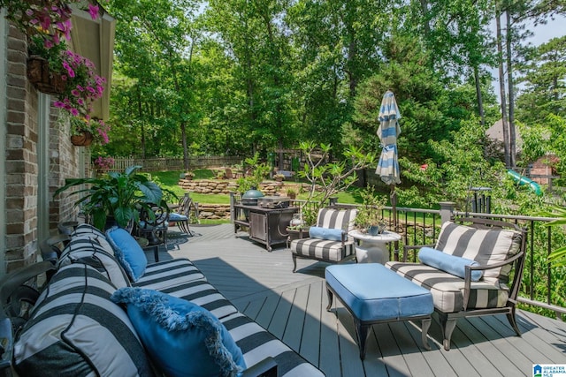 1016 Locksley Cir, Birmingham, AL 35242 - wooden deck featuring view of wooded area and an outdoor living space