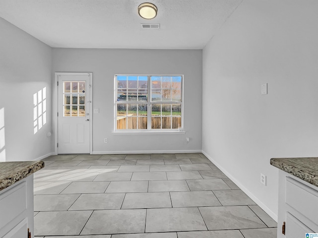 view of unfurnished dining area