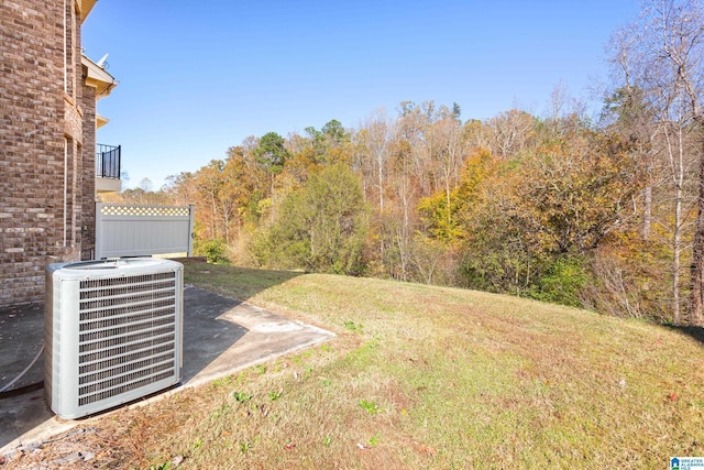 view of yard with central AC