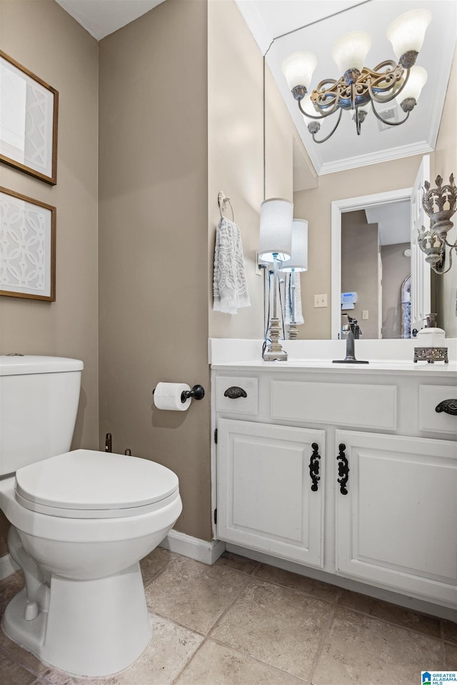 bathroom with vanity, a chandelier, crown molding, and toilet