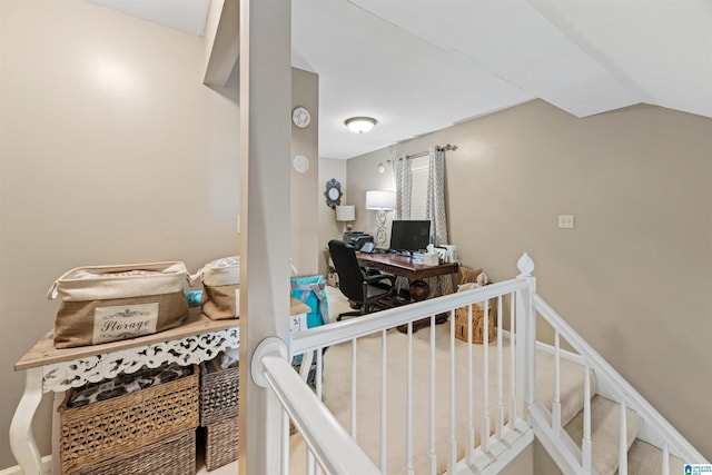 home office featuring vaulted ceiling