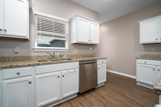 kitchen with white cabinetry, dishwasher, sink, light stone countertops, and dark wood-type flooring