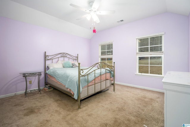 carpeted bedroom with lofted ceiling and ceiling fan
