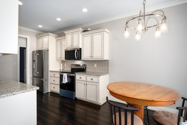 kitchen with stainless steel appliances, backsplash, crown molding, dark hardwood / wood-style floors, and pendant lighting