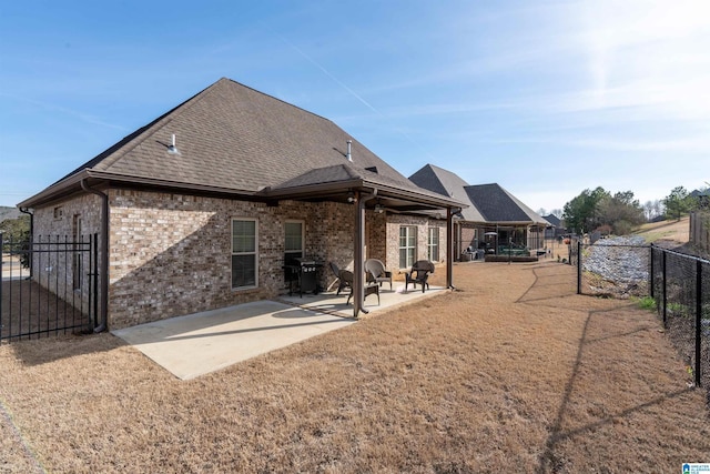 back of house featuring a patio area