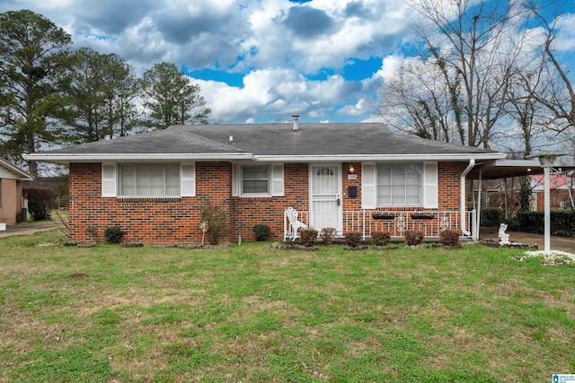 ranch-style home with a front lawn and a carport