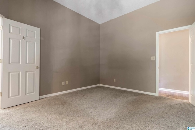 unfurnished room with carpet