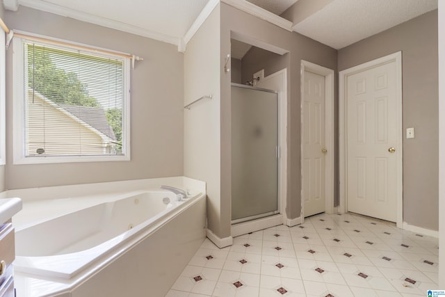 bathroom featuring crown molding and independent shower and bath