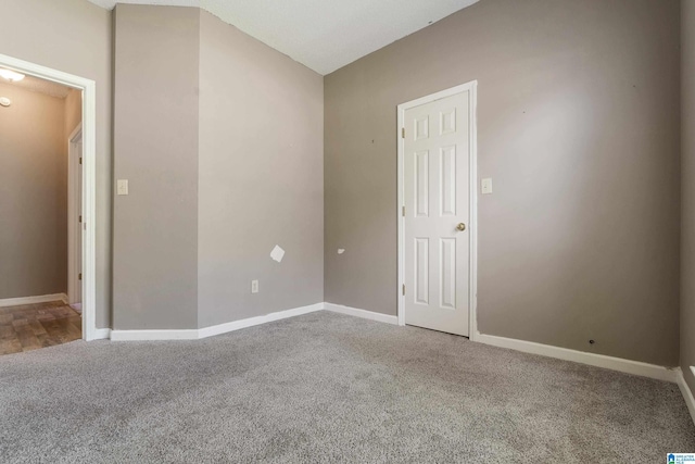 spare room with carpet floors