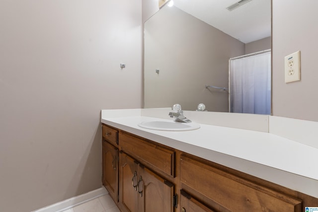 bathroom featuring vanity and tile patterned floors