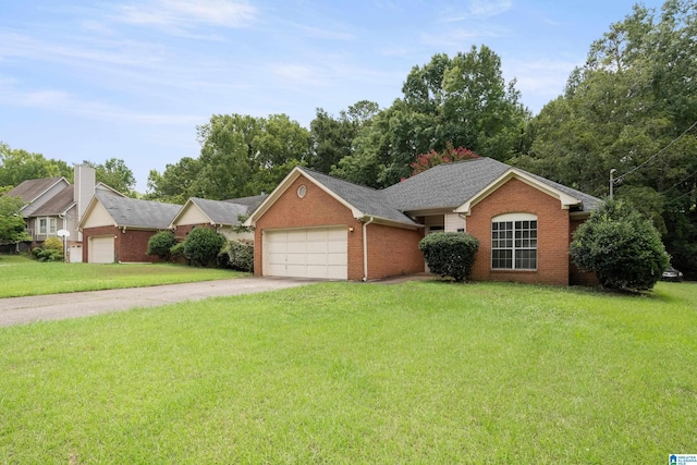 single story home featuring a garage and a front lawn