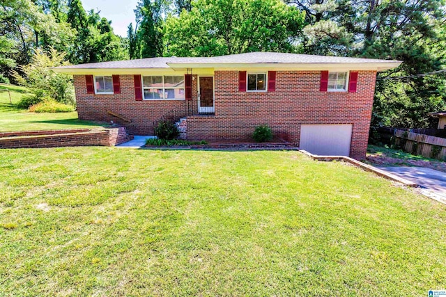 view of front of property featuring a garage and a front yard