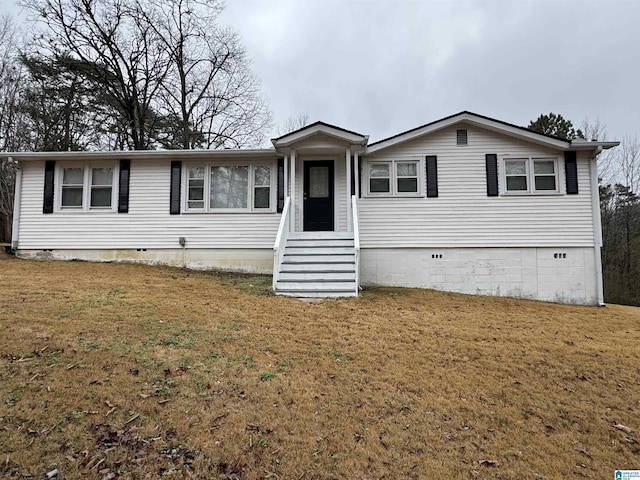 ranch-style house with a front yard, crawl space, and entry steps