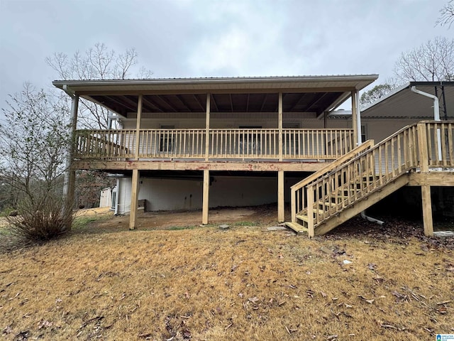 exterior space with stairway and a wooden deck