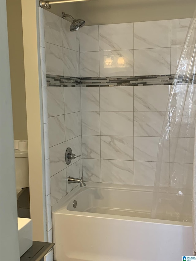 full bath featuring shower / tub combo