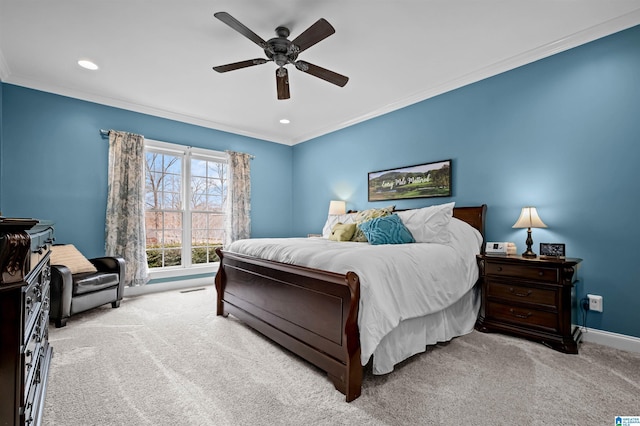 bedroom with ornamental molding, light carpet, baseboards, and a ceiling fan