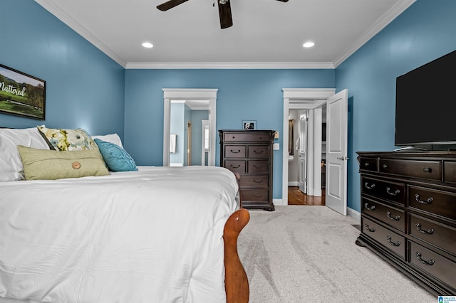 bedroom featuring light carpet, baseboards, a ceiling fan, ornamental molding, and recessed lighting