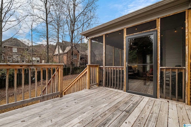 deck featuring a sunroom