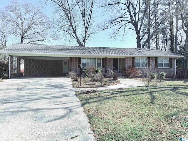 ranch-style home with a carport and a front lawn