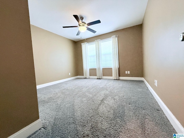 unfurnished room with carpet floors and ceiling fan