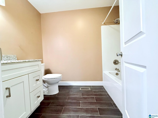 full bathroom with vanity, shower / bathing tub combination, and toilet