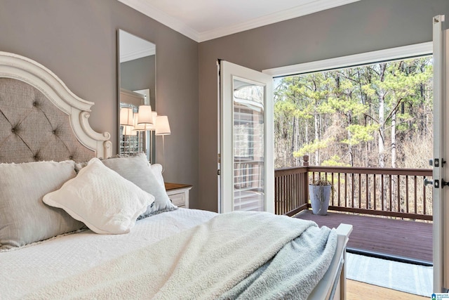 bedroom with hardwood / wood-style flooring and crown molding