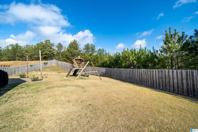 view of yard featuring a playground