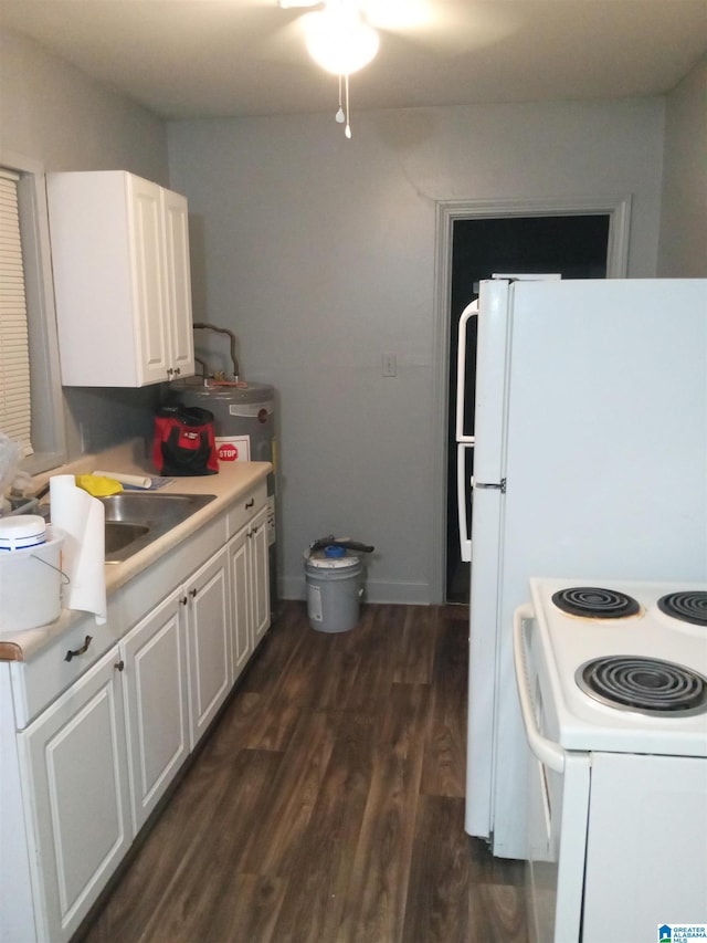 kitchen featuring white cabinetry, white appliances, dark hardwood / wood-style floors, and sink