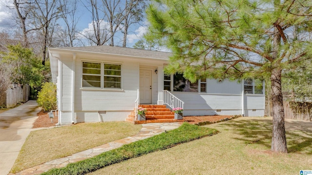 view of front of home with a front yard