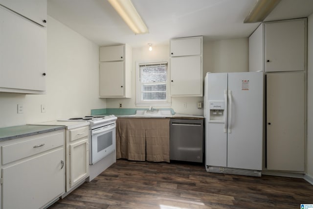 kitchen with sink, white appliances, white cabinets, and dark hardwood / wood-style floors