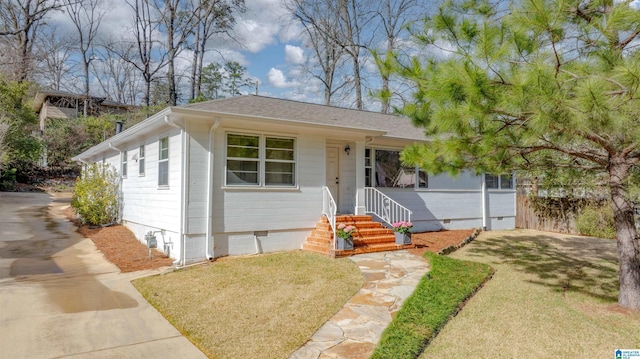 ranch-style home with a front yard