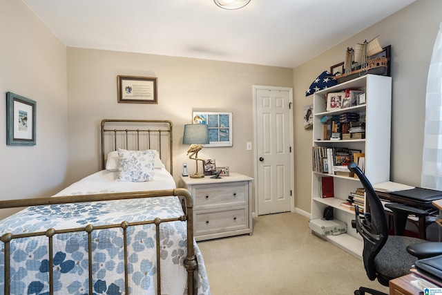 bedroom with light colored carpet