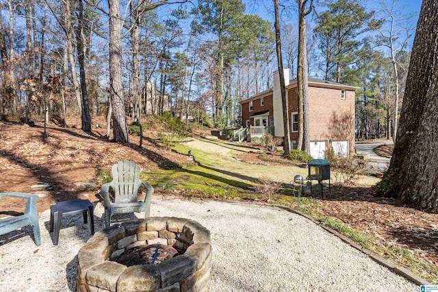 view of patio / terrace featuring a fire pit