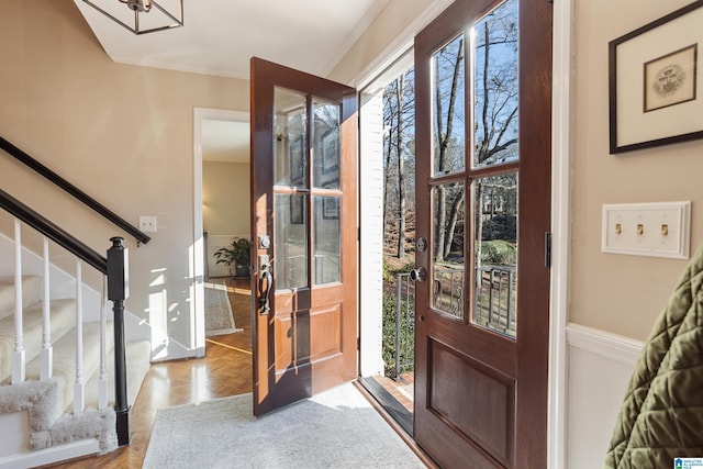 foyer entrance featuring light parquet floors