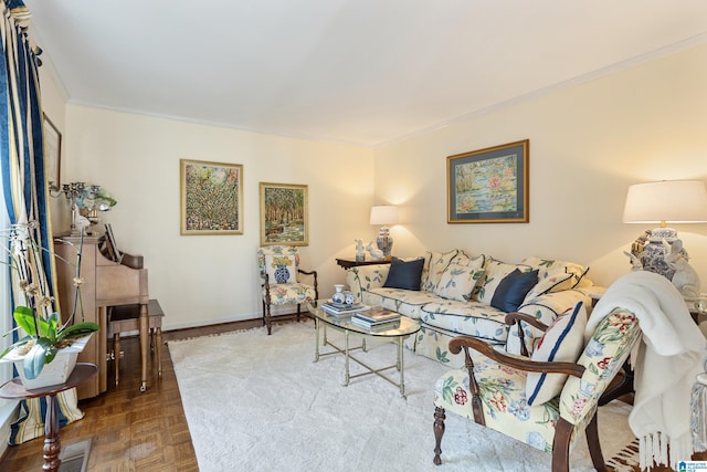 living room featuring ornamental molding and dark parquet flooring