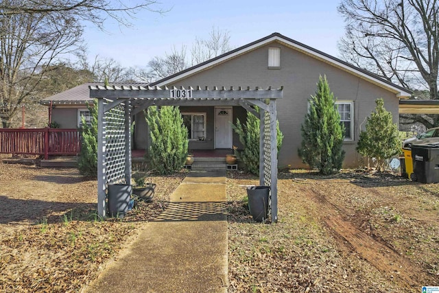 view of front of home with a pergola