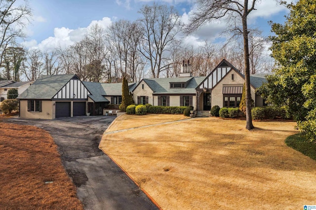 tudor home with a garage