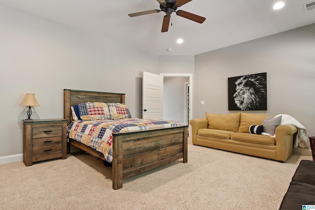 carpeted bedroom with ceiling fan