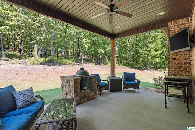 view of patio featuring grilling area, outdoor lounge area, and ceiling fan