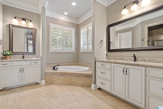 bathroom featuring tiled tub, crown molding, and vanity