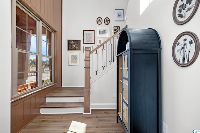 stairway featuring hardwood / wood-style floors