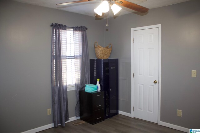 1536 Buckelew Bridge Rd, Anniston, AL 36207 - bedroom featuring ceiling fan, dark wood-type flooring, and baseboards