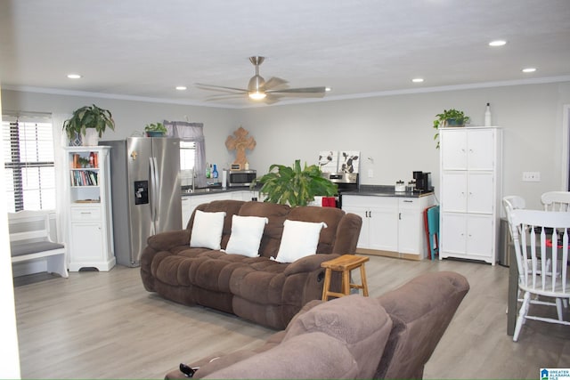 1536 Buckelew Bridge Rd, Anniston, AL 36207 - living area featuring ornamental molding, a wealth of natural light, light wood finished floors, and recessed lighting