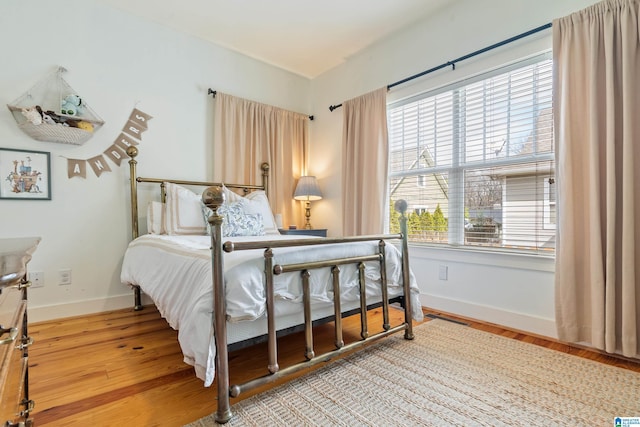 bedroom featuring light hardwood / wood-style flooring