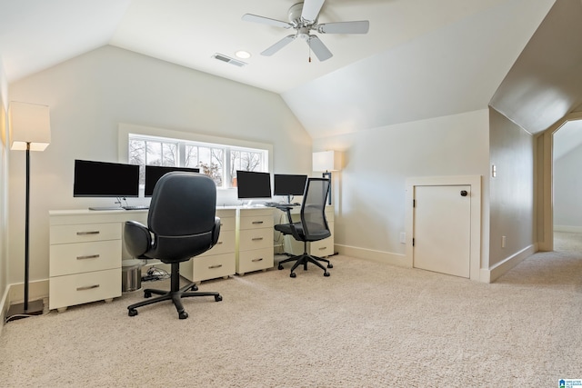 carpeted office with vaulted ceiling and ceiling fan